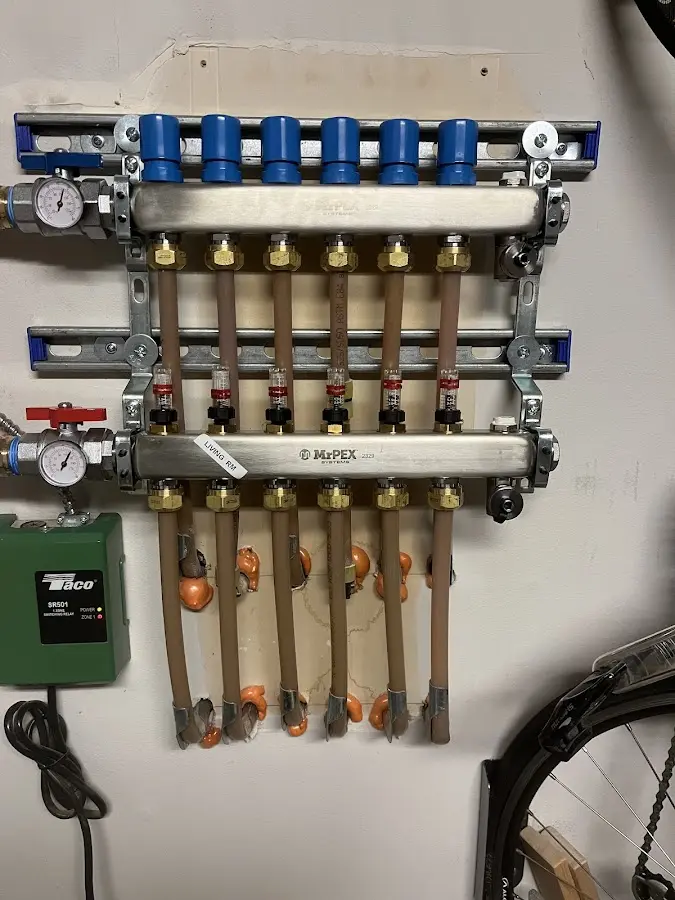 Plumber performing Water Heater Repair at a residential property in Ada